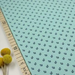 Bio Jersey Motiv Anchors Von Stoffonkel In Türkis Mit Dunkelblauen Ankern
